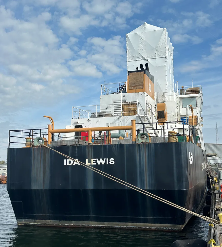 U.S. Coast Guard cutter IDA LEWIS with scaffolded, shrink-wrapped stack at the pier